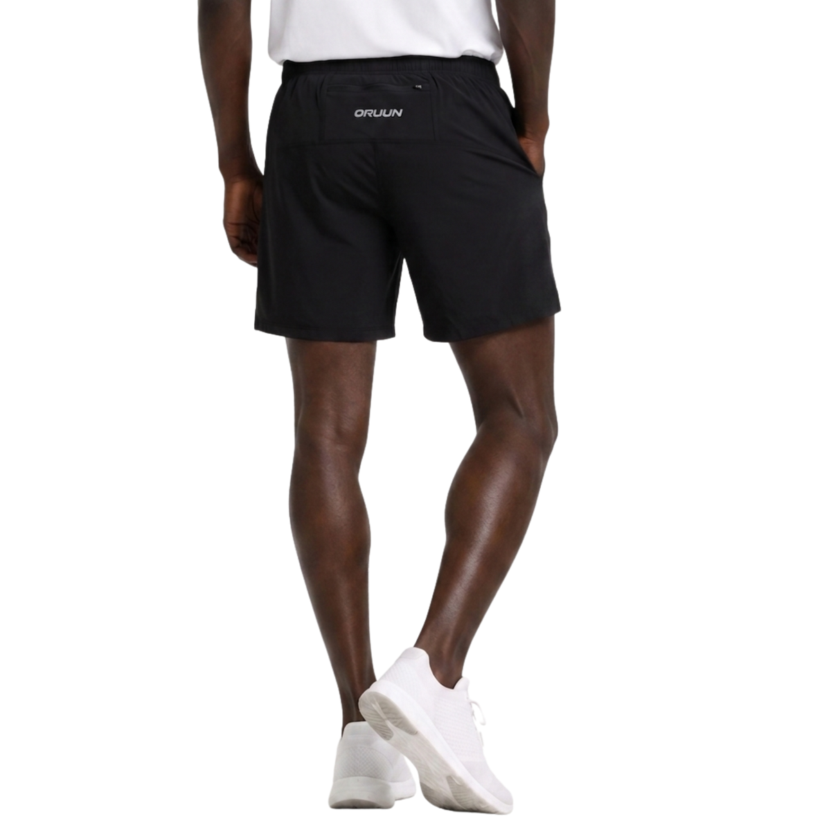 ORUUN Aero Motion running shorts in black worn by runner, back view – lightweight running shorts with zip pocket